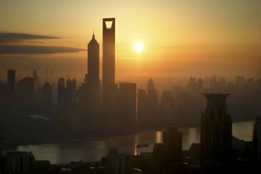 The Shanghai World Financial Center (right) and the Jin Mao Tower (left).
