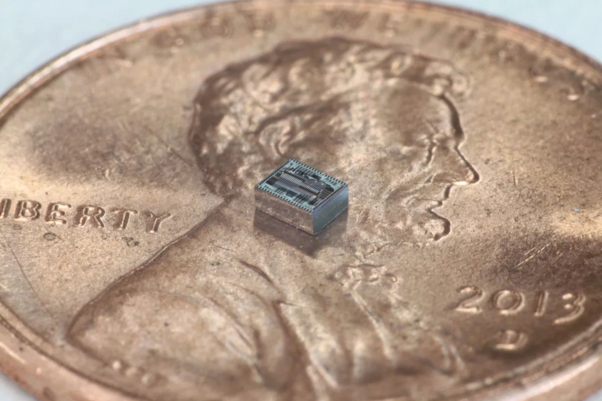 Caltech researchers have used an ultra-thin optical phased array chip (pictured on a penny for scale) to create a lensless camera