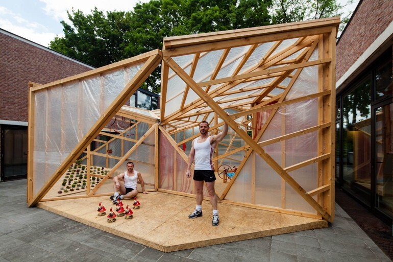 The JF-Kit House is a modular “parasitic” structure that's affixed onto existing walls and rooftops, leeching any available heat off the host structure (Photo: Miguel de Guzmán)