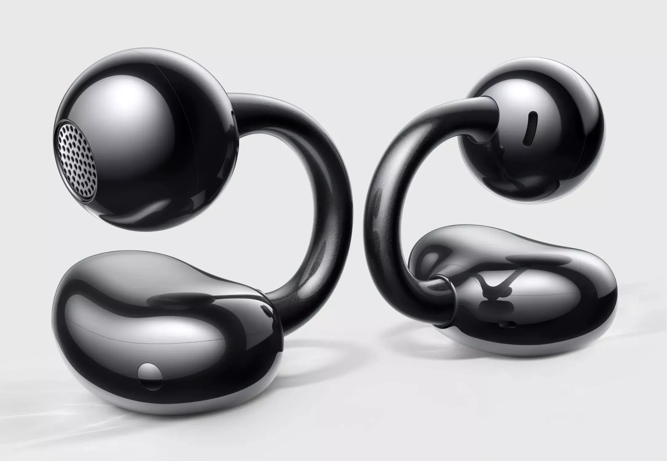 Each FreeClip is home to a speaker ball and comfort bean connected by a C-bridge