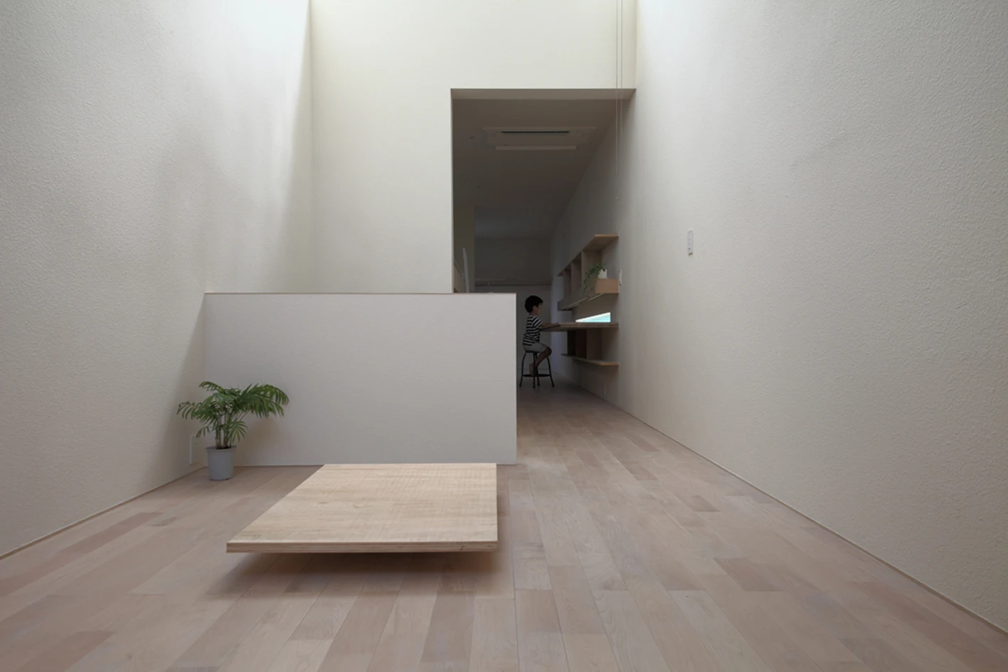 As befits such a small and narrow home, the interior is very simple and unfussy (Photo: Katsutoshi Sasaki and Associates)