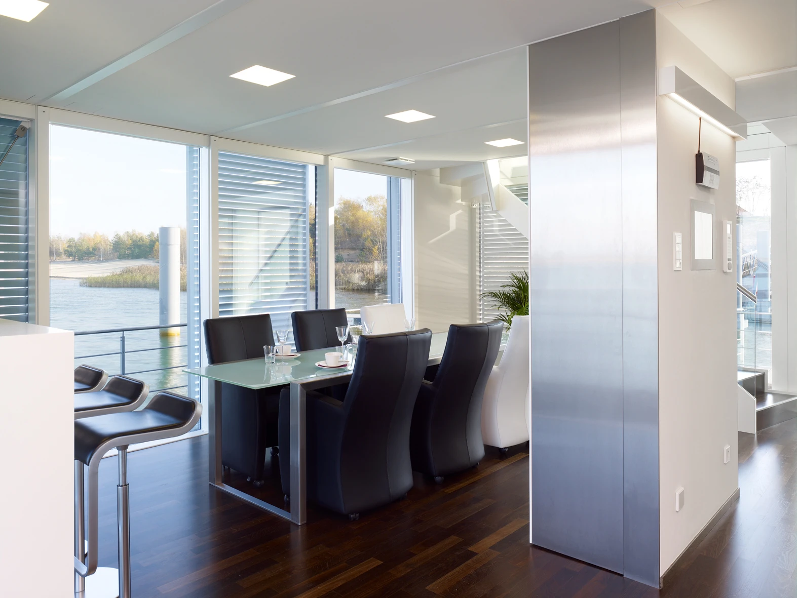 The lower deck features an open and modern dining area
