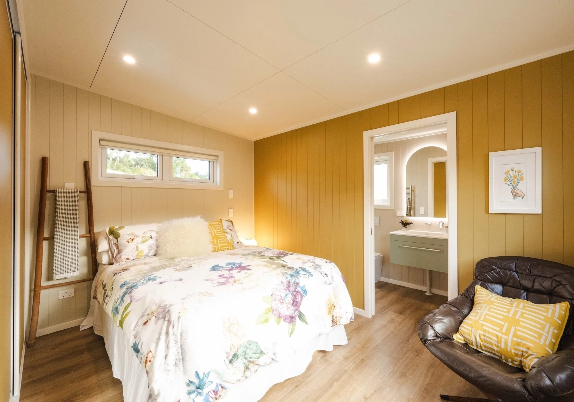 The English Garden's bathroom is accessed through the bedroom, as per the owner's wishes