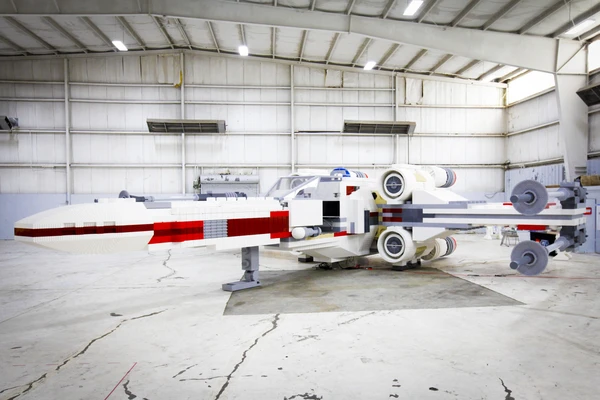 The 1:1 scale Lego X-Wing in an aircraft hangar in Long Island before making its way to Times Square