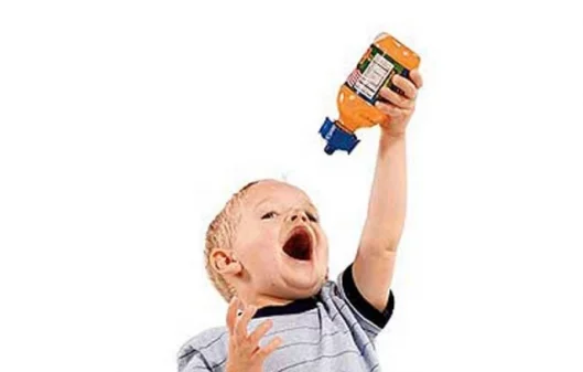 Spill-proof cap transforms an adult-size drink bottle into a kid's sippy cup