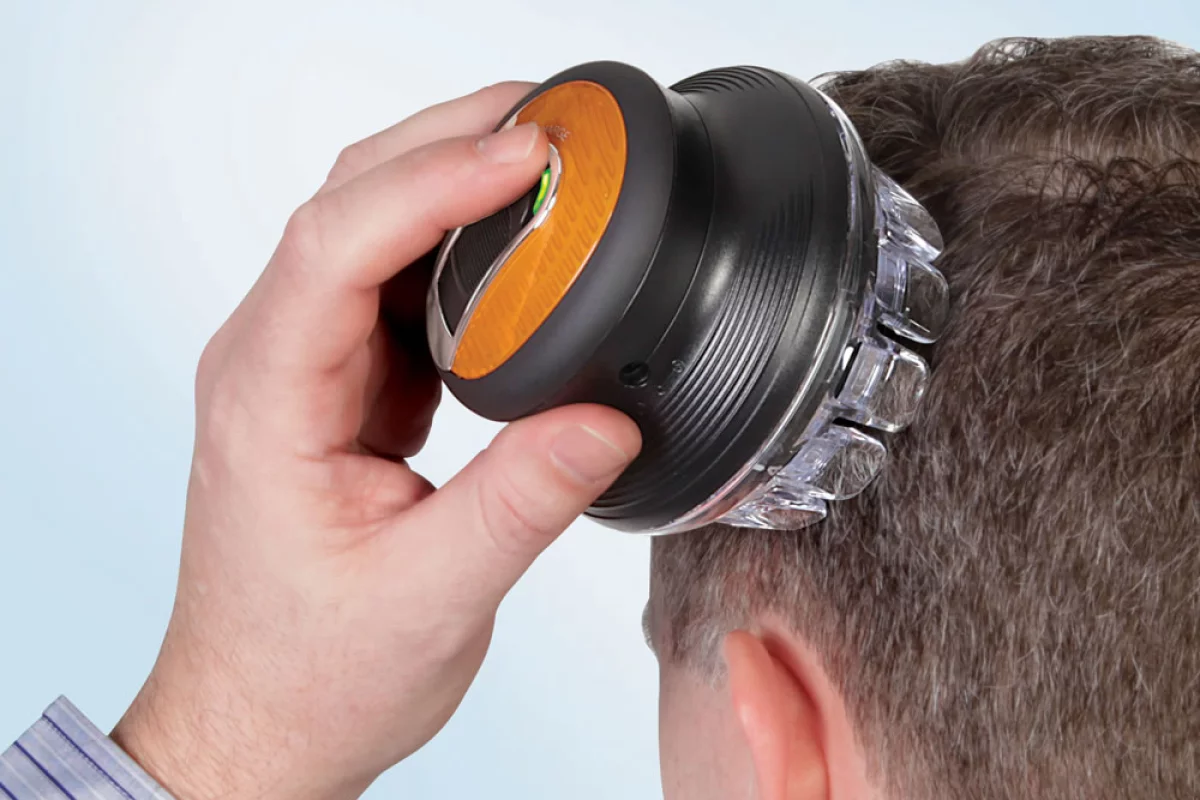 The Single Handed Barber uses a rotary system to allow users to cut their own hair evenly with one hand