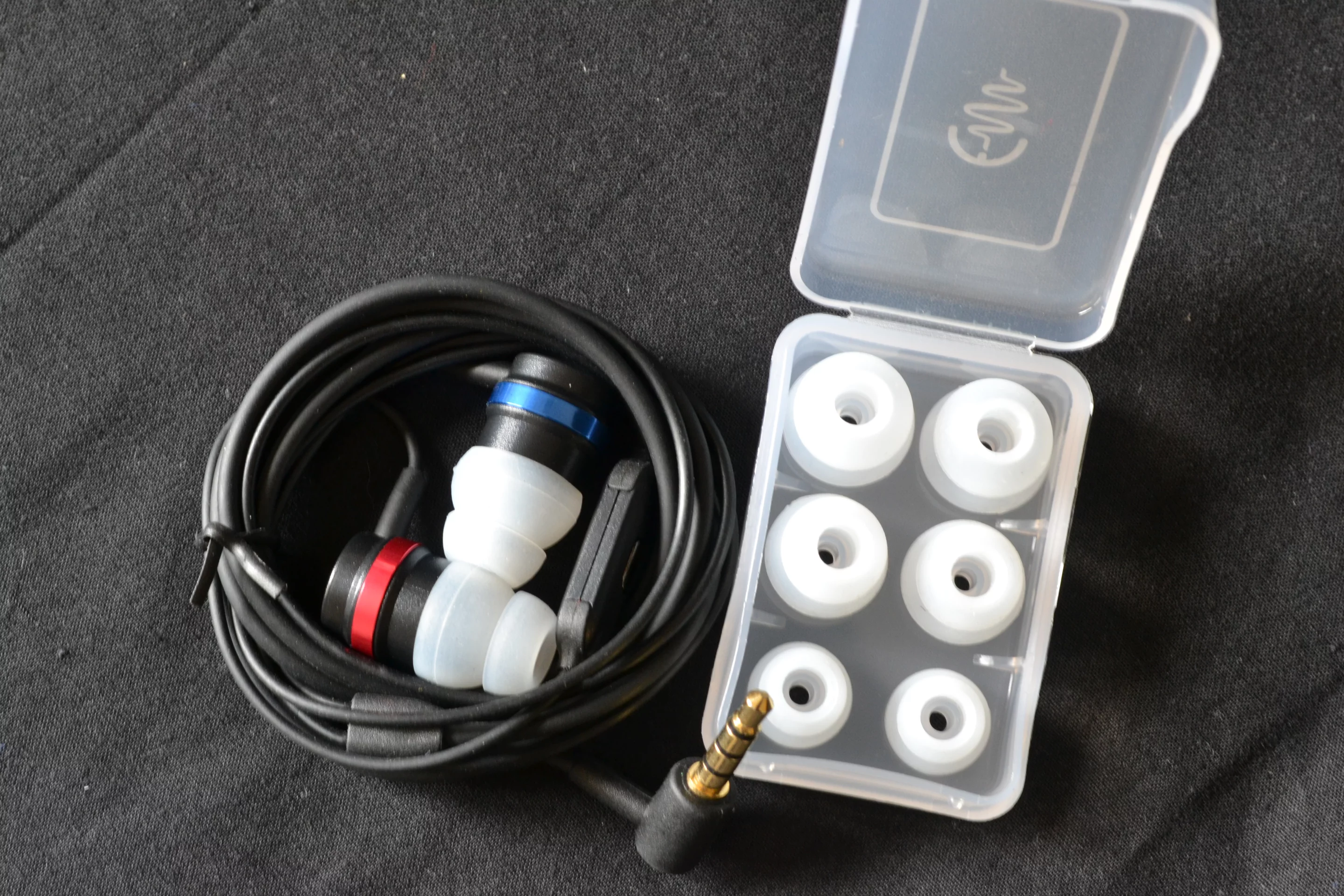 In addition to the medium double-length silicone tips already on the earphones, the PAE-300 comes supplied with a box of large, medium and small spares