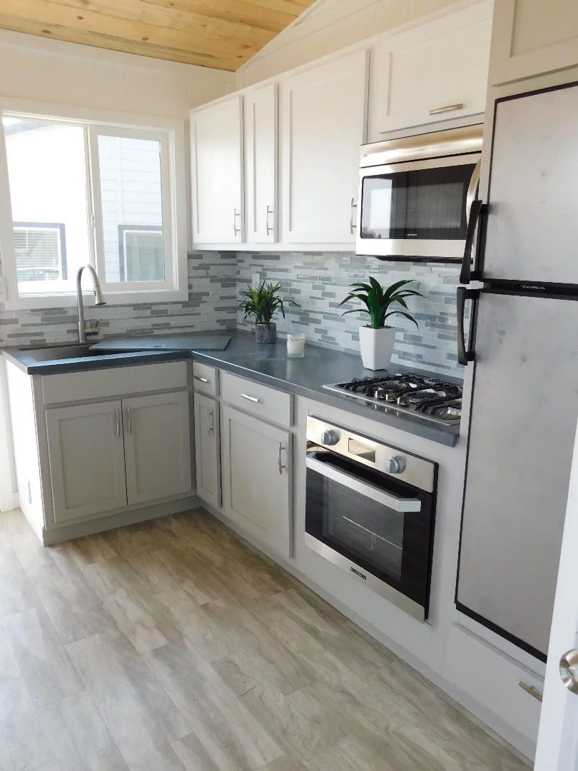 The Ozark's kitchen is relatively large for a tiny house of its size and includes quite a bit of cabinet space