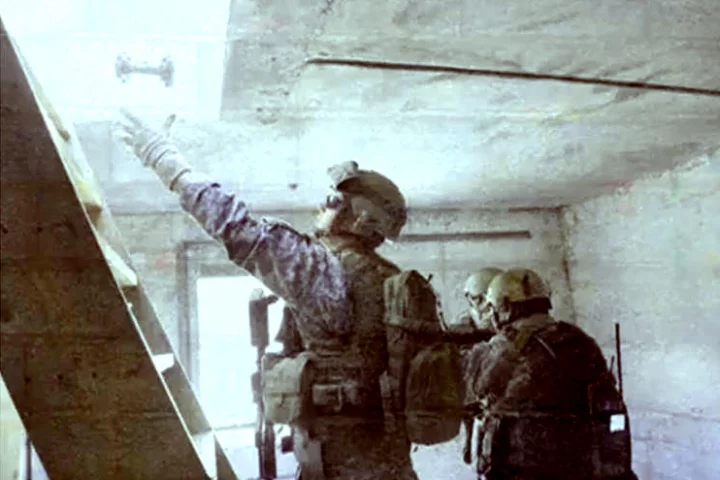 A Soldier throws a Recon Robotics Recon Scout Throwbot XT robot