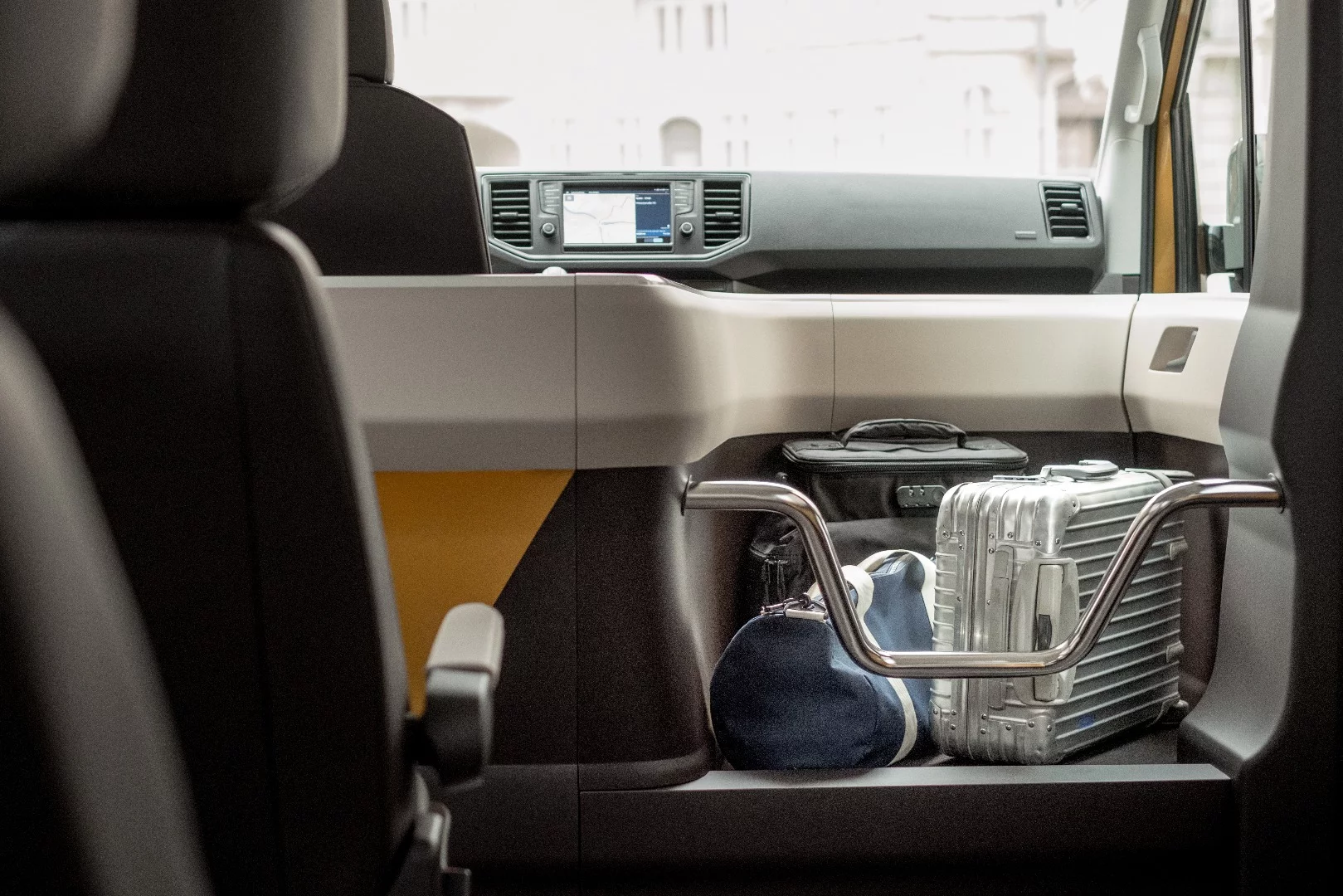 Inside Moia's spacious cabin there are a number of design elements to give it a distinct carpool feel