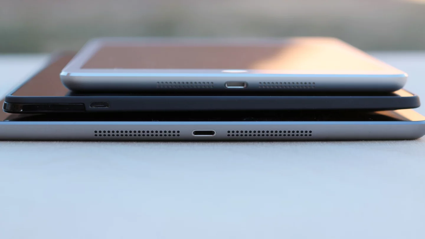 The iPads are each 7.5 mm thick, while the Fire HDX 8.9 is 7.8 mm thick