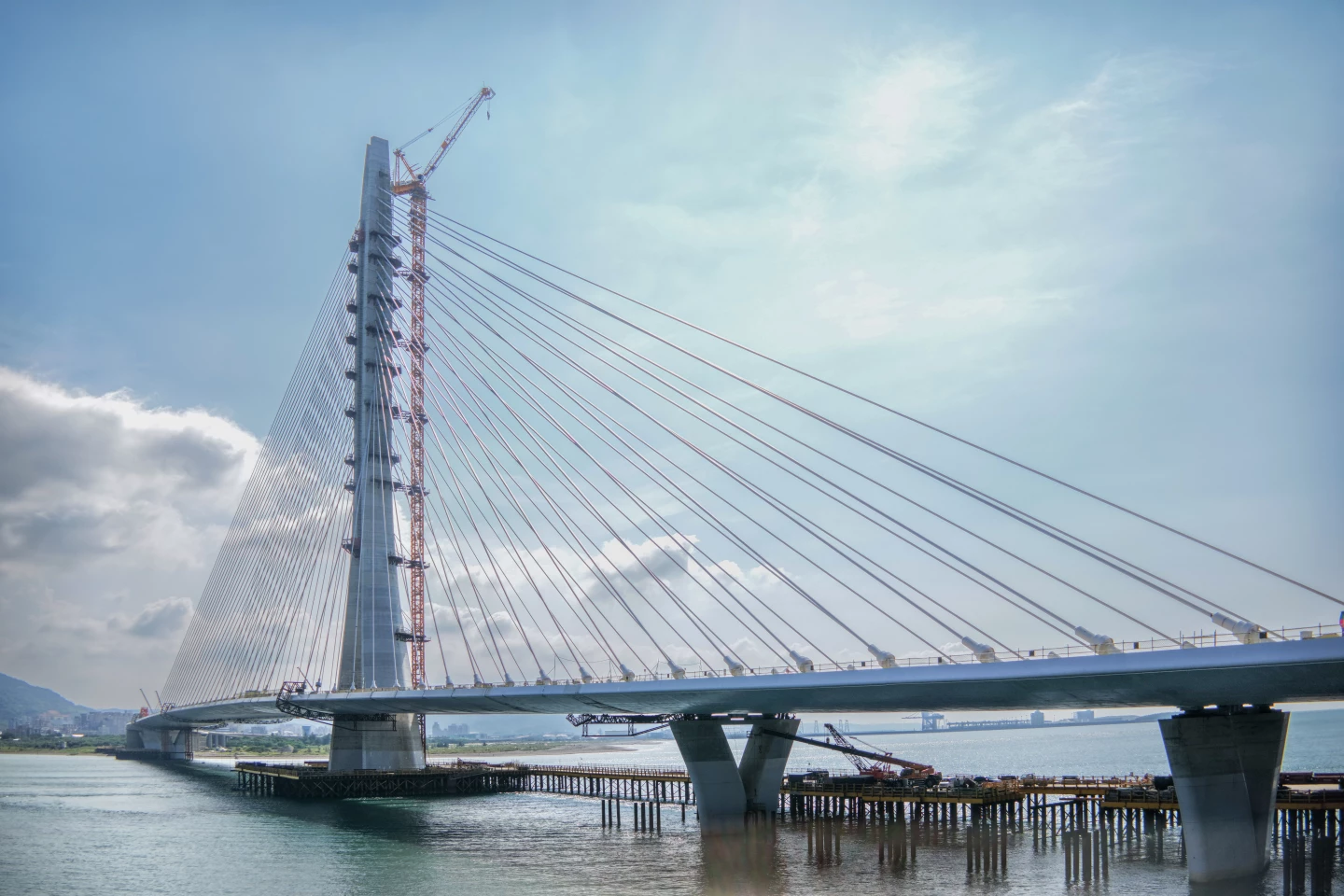 The Danjiang Bridge is hailed by Zaha Hadid Architects as as the world's longest single-mast asymmetric cable-stayed bridge