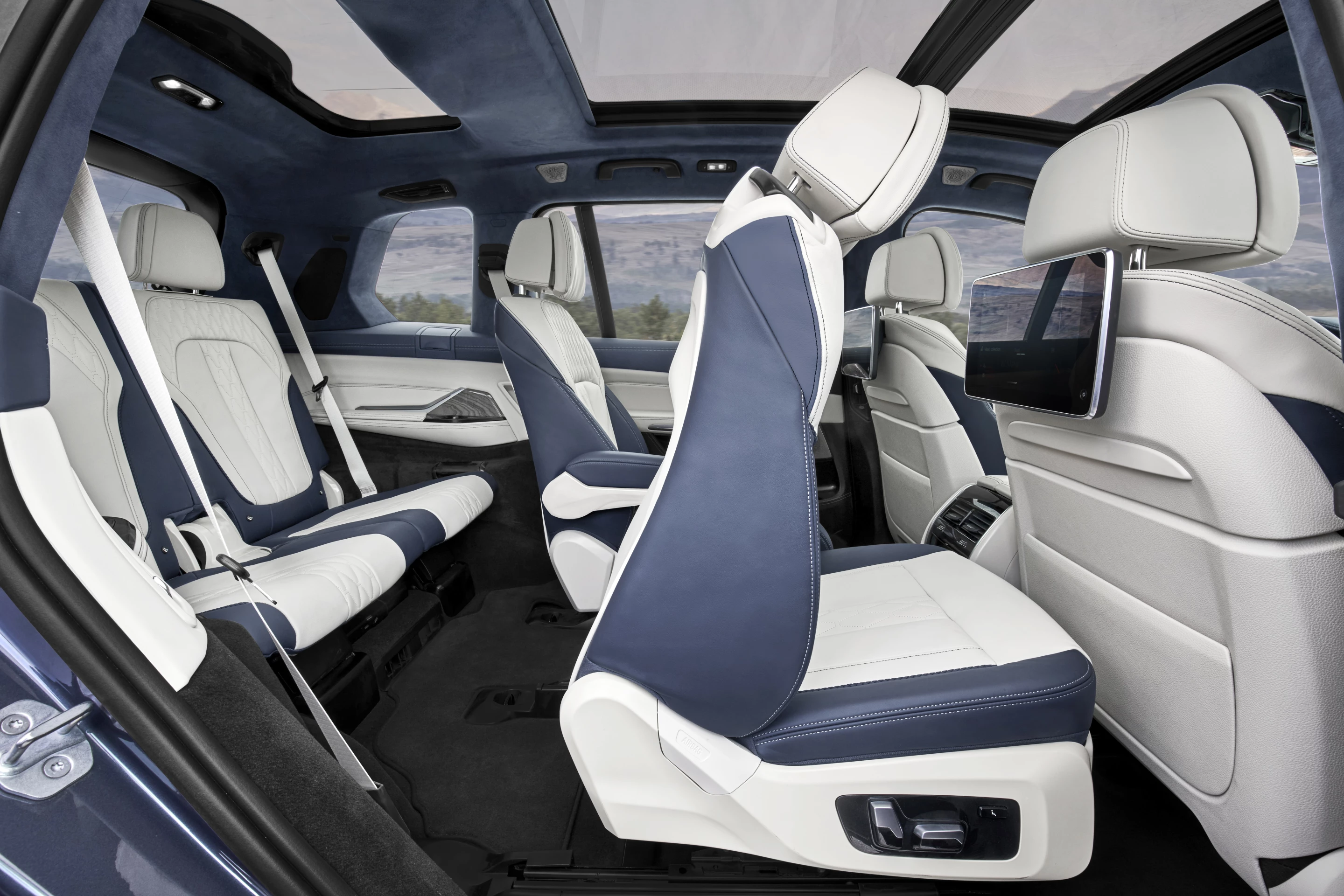 Access to the third row is a bit difficult with the standard bench in the rear of the BMW X7, but opting for the captain's chairs in the second row greatly aids third-row accessibility