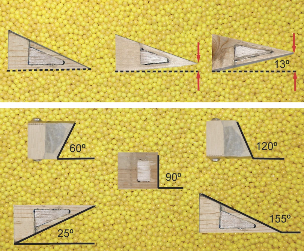 The different nose angles tried on the robot head (top), and the different leading angles of wooden blocks used in the tests (bottom)