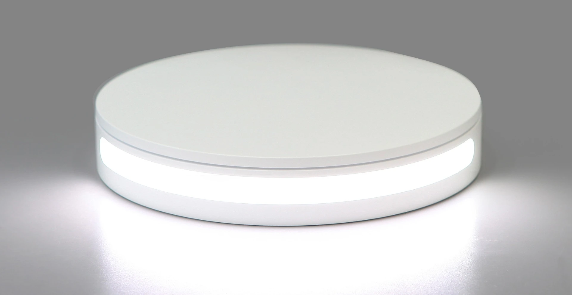 The Foldio360 turntable features a light at the rear