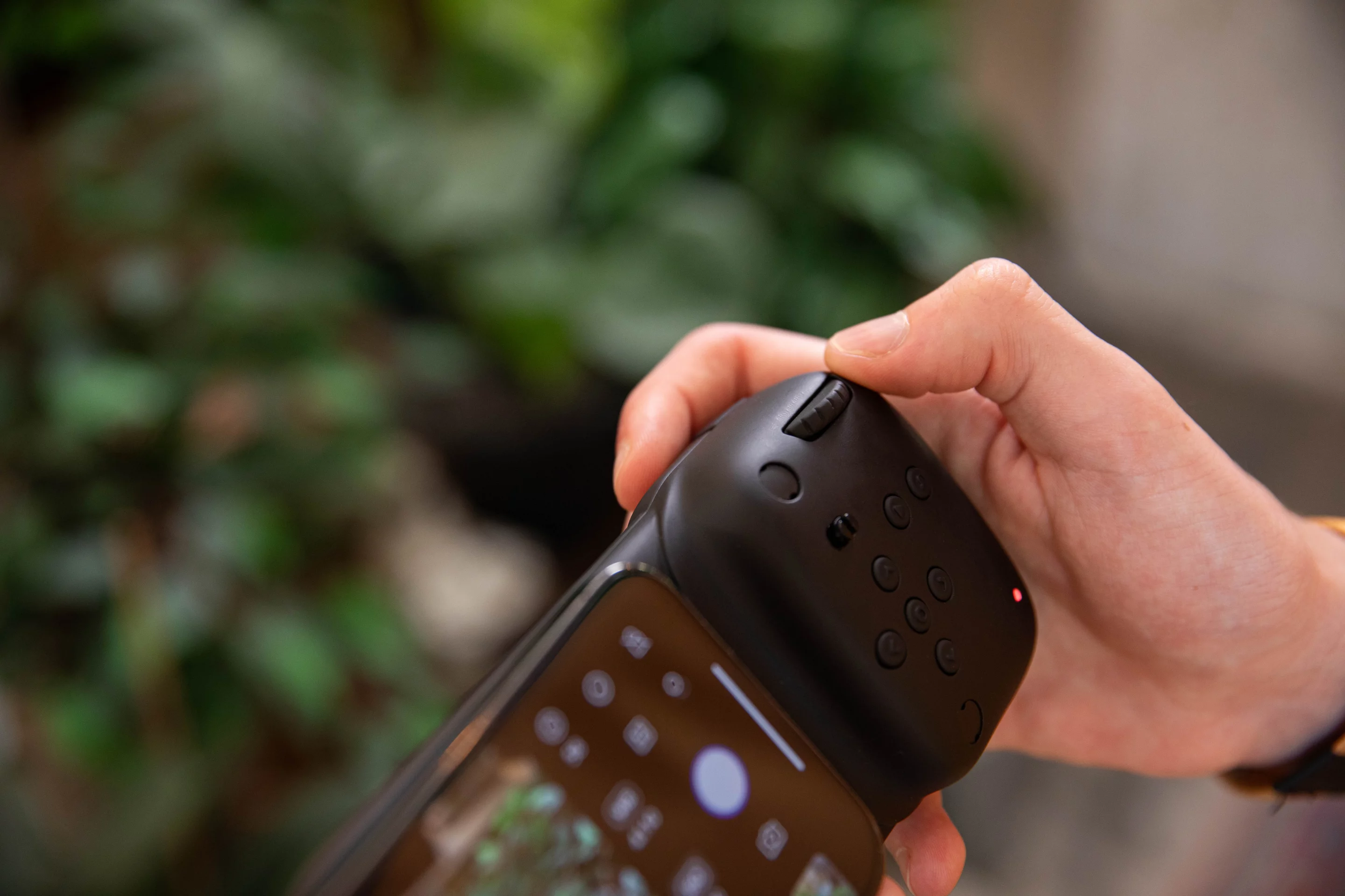 The buttons on the grip can be used to adjust light sensitivity, white balance and focus