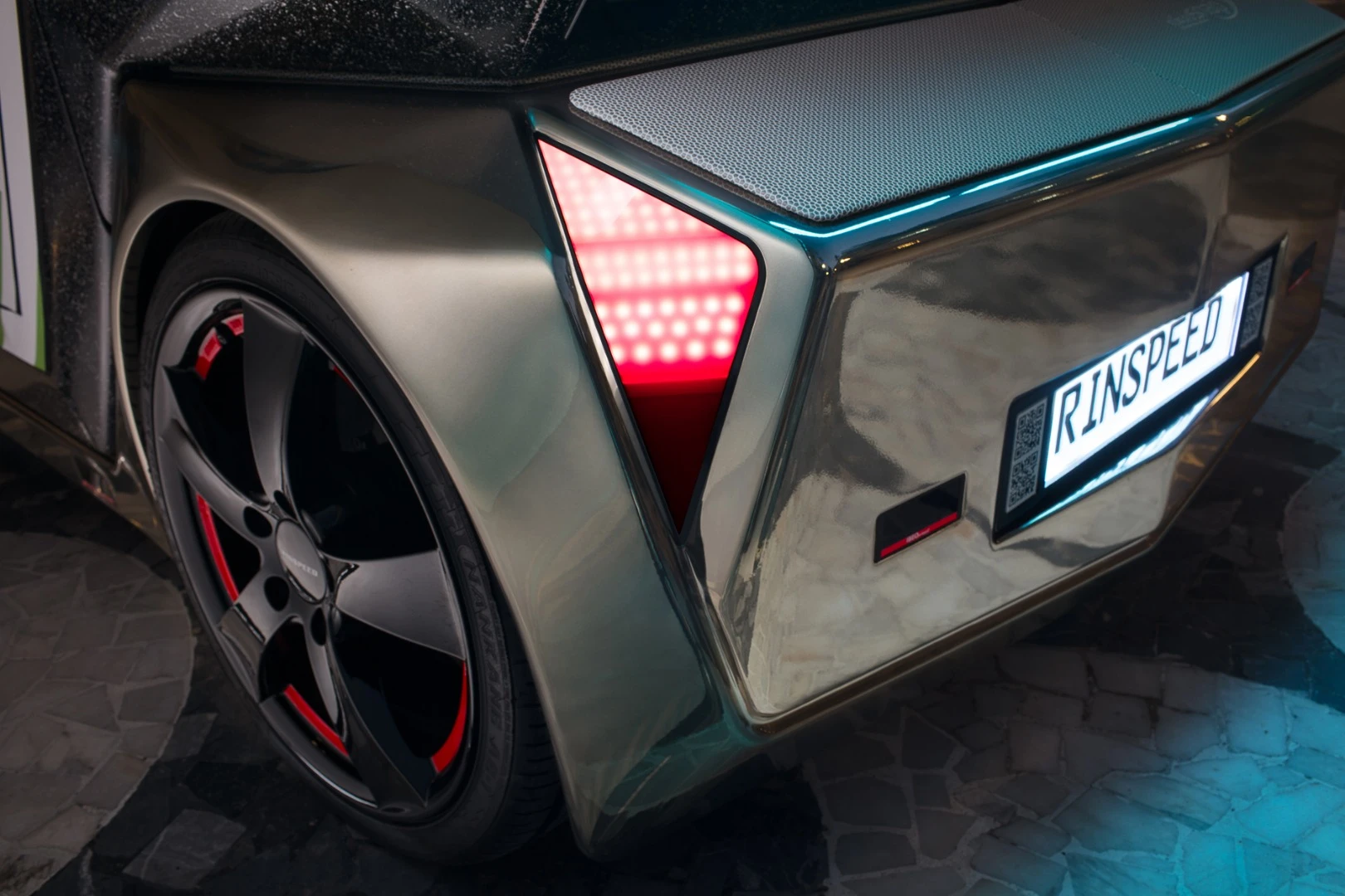 The microSNAP features a digital license plate, along with exterior lighting that communicates with other drivers