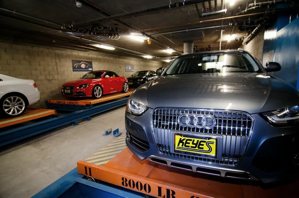 Cars are stored on pallets in the lower level of the four-level Auto Parkit storage facility