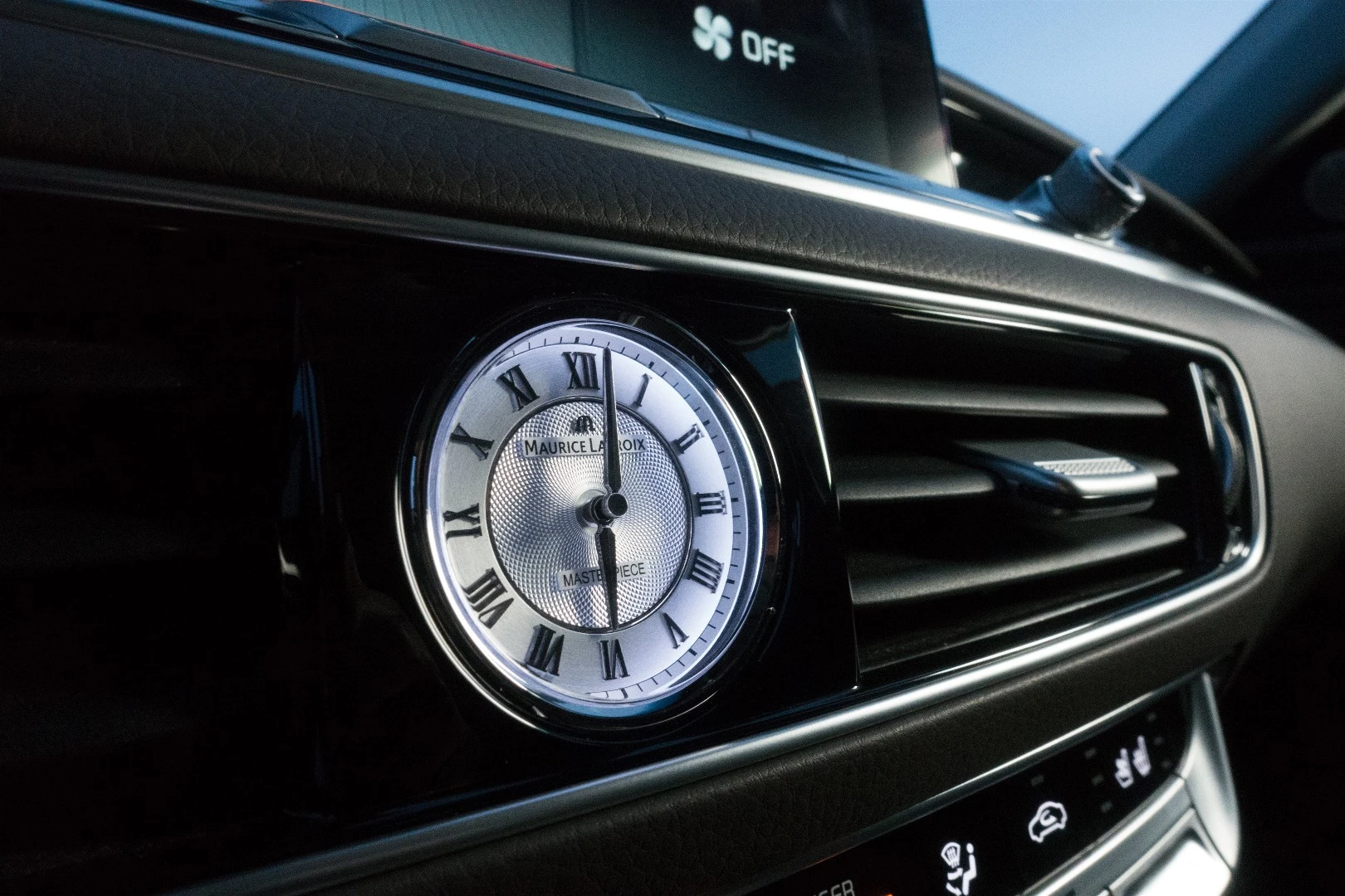 Shaking things up a bit, Kia eschewed the usual numberless clock in luxury sedans and used this one with Roman numerals instead