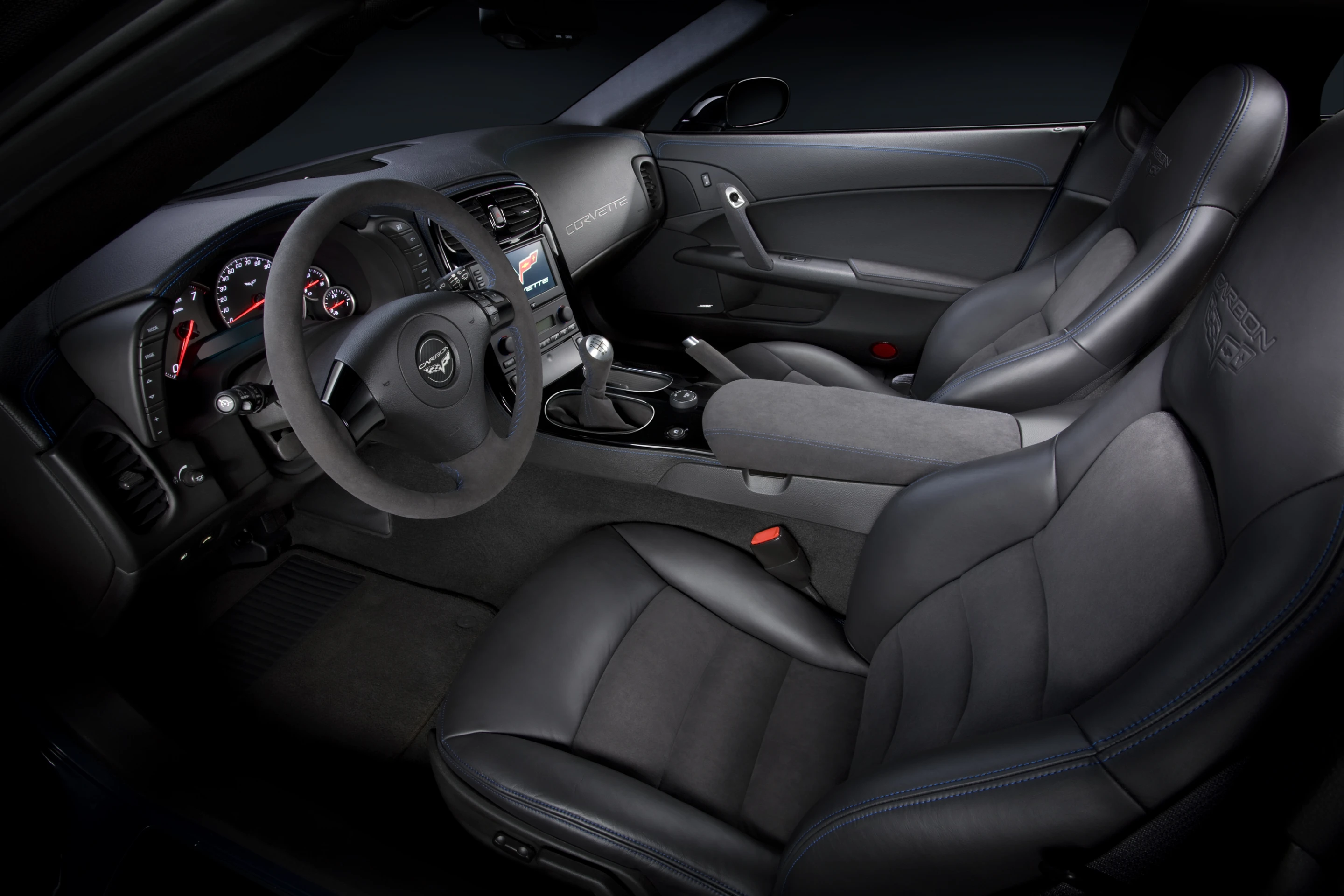 The interior is lashed with ebony leather and suede
