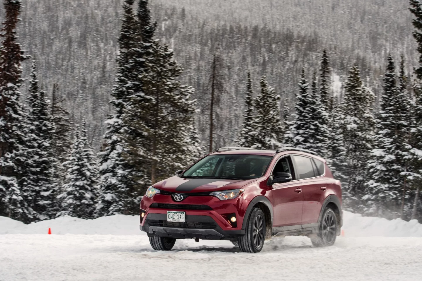 A little goosing and some gearing control allowed the Toyota RAV4 Adventure to slide some corners on the snow and ice, but a lack of power keeps it from being overly keen