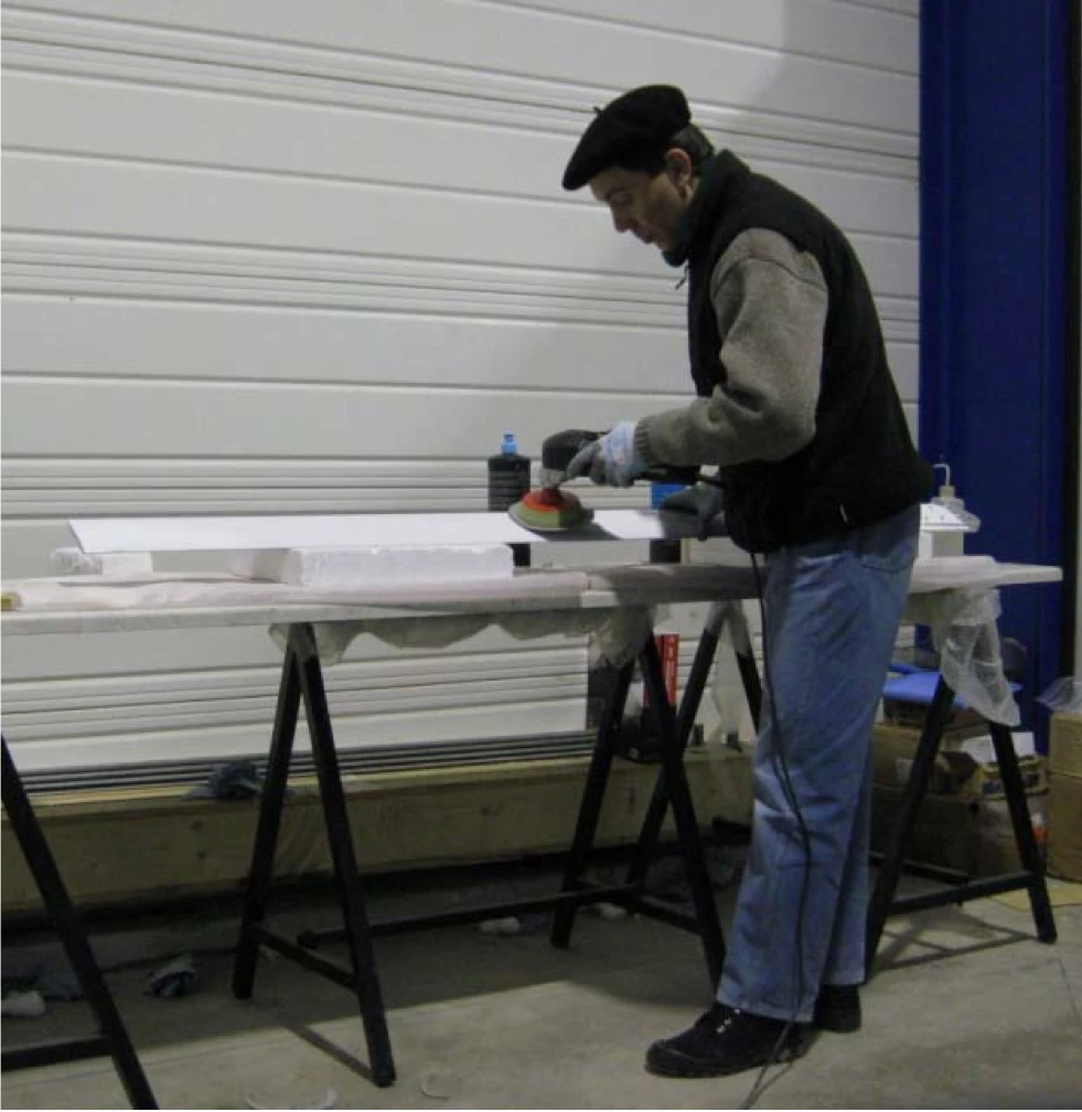 Pascal Chretien works on his electric helicopter