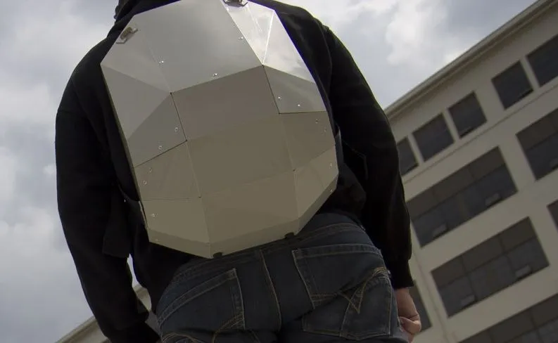 The Solid Gray backpack features a rigid foldable design, and is made from a single sheet of copolymer