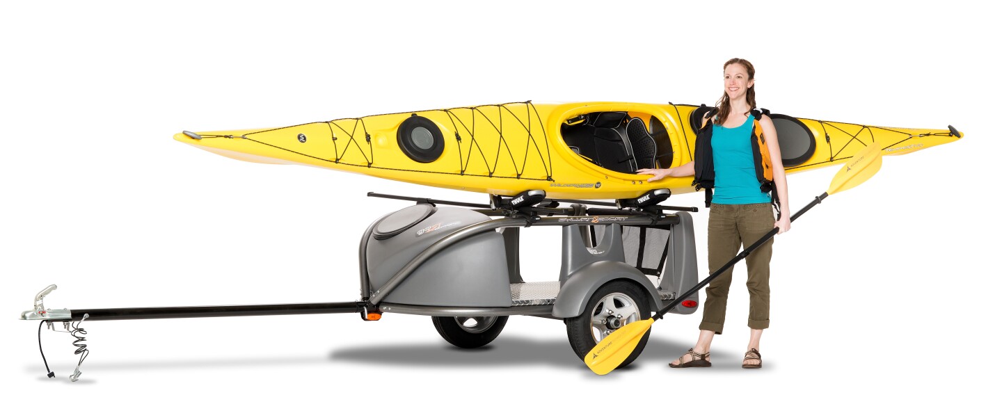 GO Easy ultralight trailer/camper rides behind a motorcycle or small car