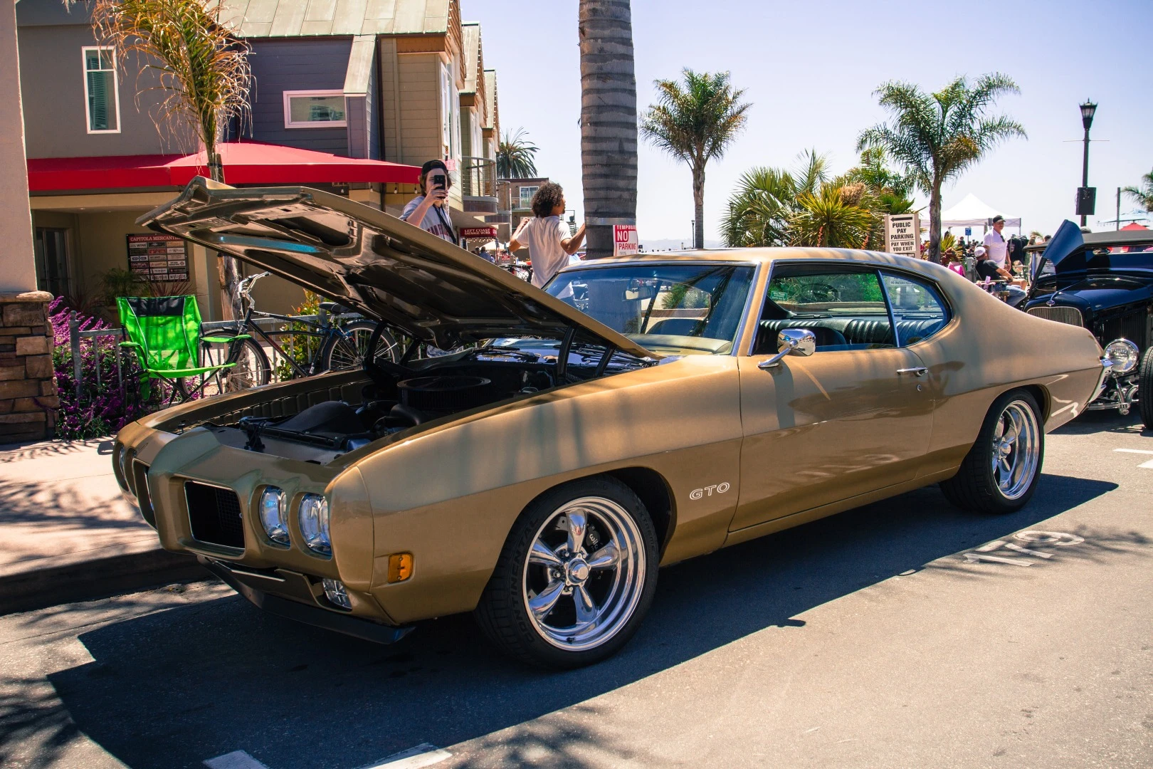 The 1970 Pontiac GTO. What does GTO mean? Gran Turismo Omologato. It was John DeLorean's idea, inspired by Ferrari's 250 GTO