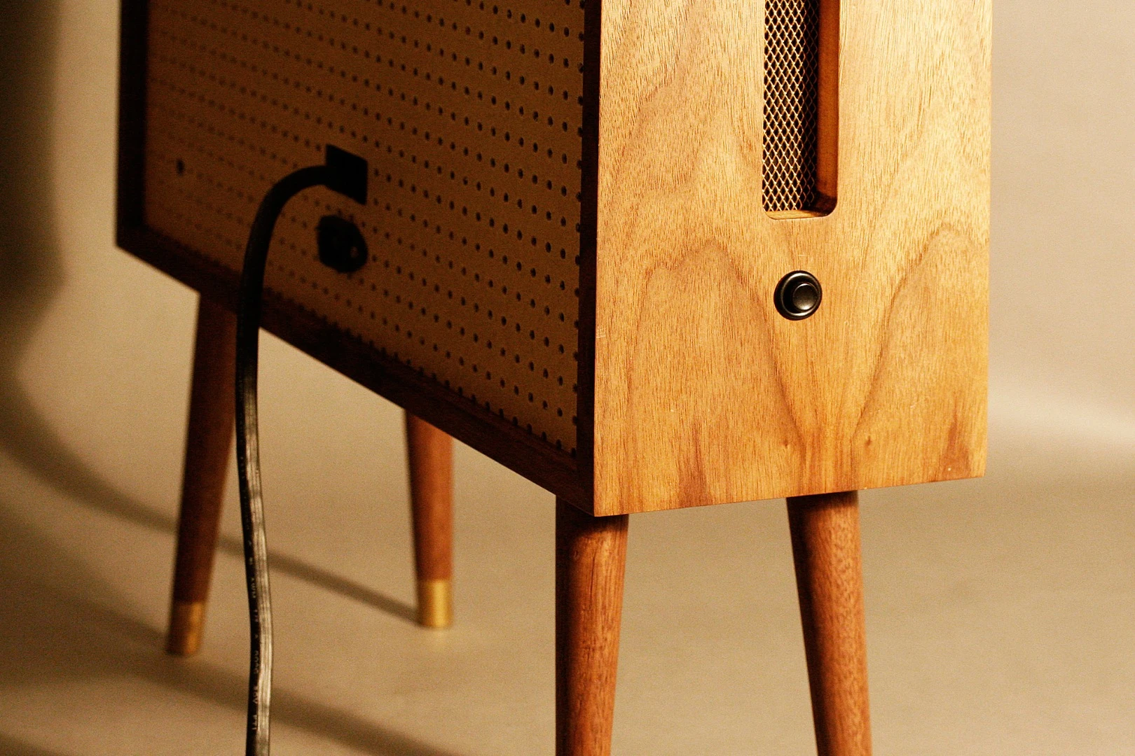Yesterday Vision is a series of wooden enclosures for LCD televisions and monitors designed to replicate old TVs from the 1950s and 60s