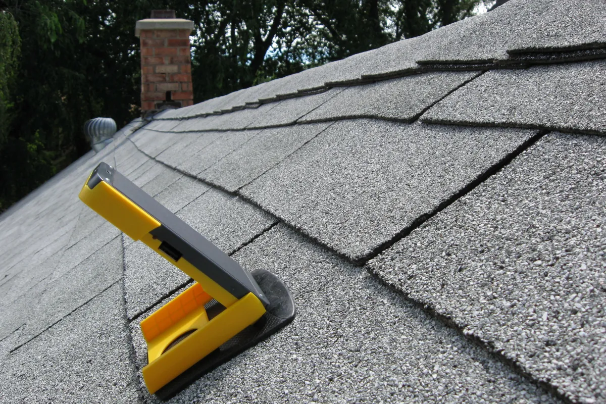 This is what you do when you're testing solar-powered gadgets in a tree-filled neighborhood – you put 'em on the roof