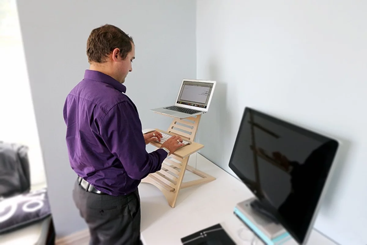 Elevate makes it possible to use any existing desktop or table surface as a standing desk surface for your laptop