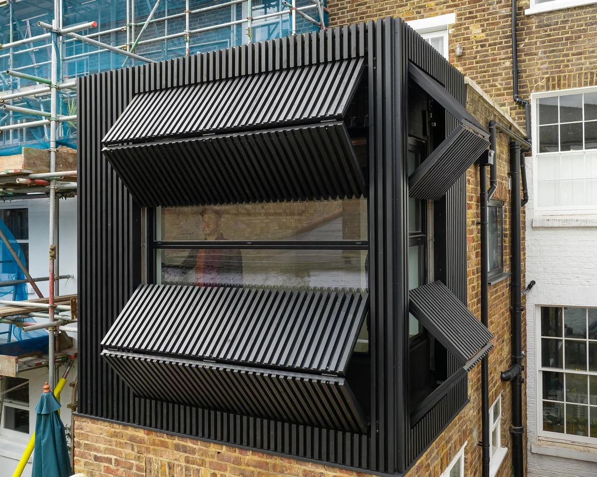 Black Box's shutters are operated by hand crank