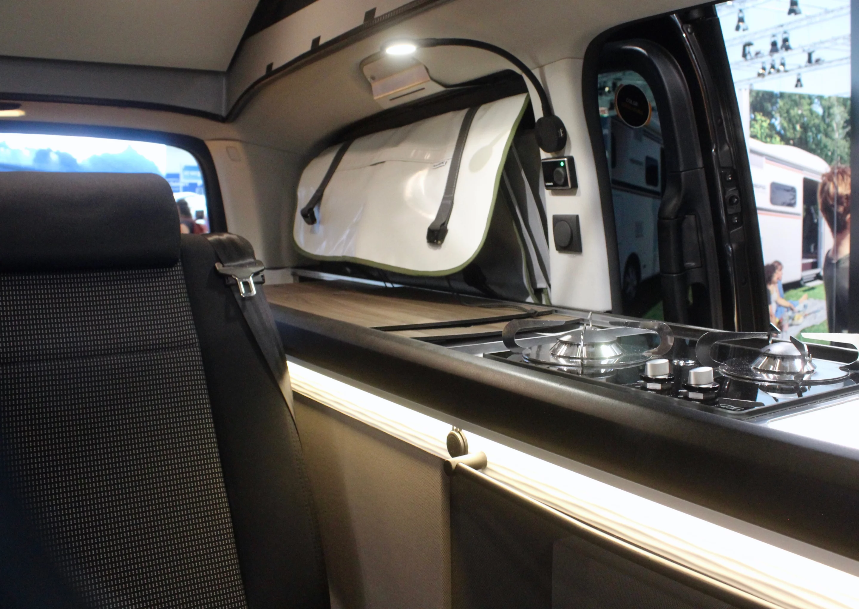 The soft bags in the rear windows offer a light, easily removable storage solution