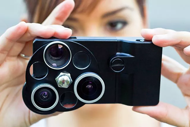 The iPhone Lens Dial features wide angle, fisheye and telephoto lenses, which swivel into place over top of the existing camera's lens