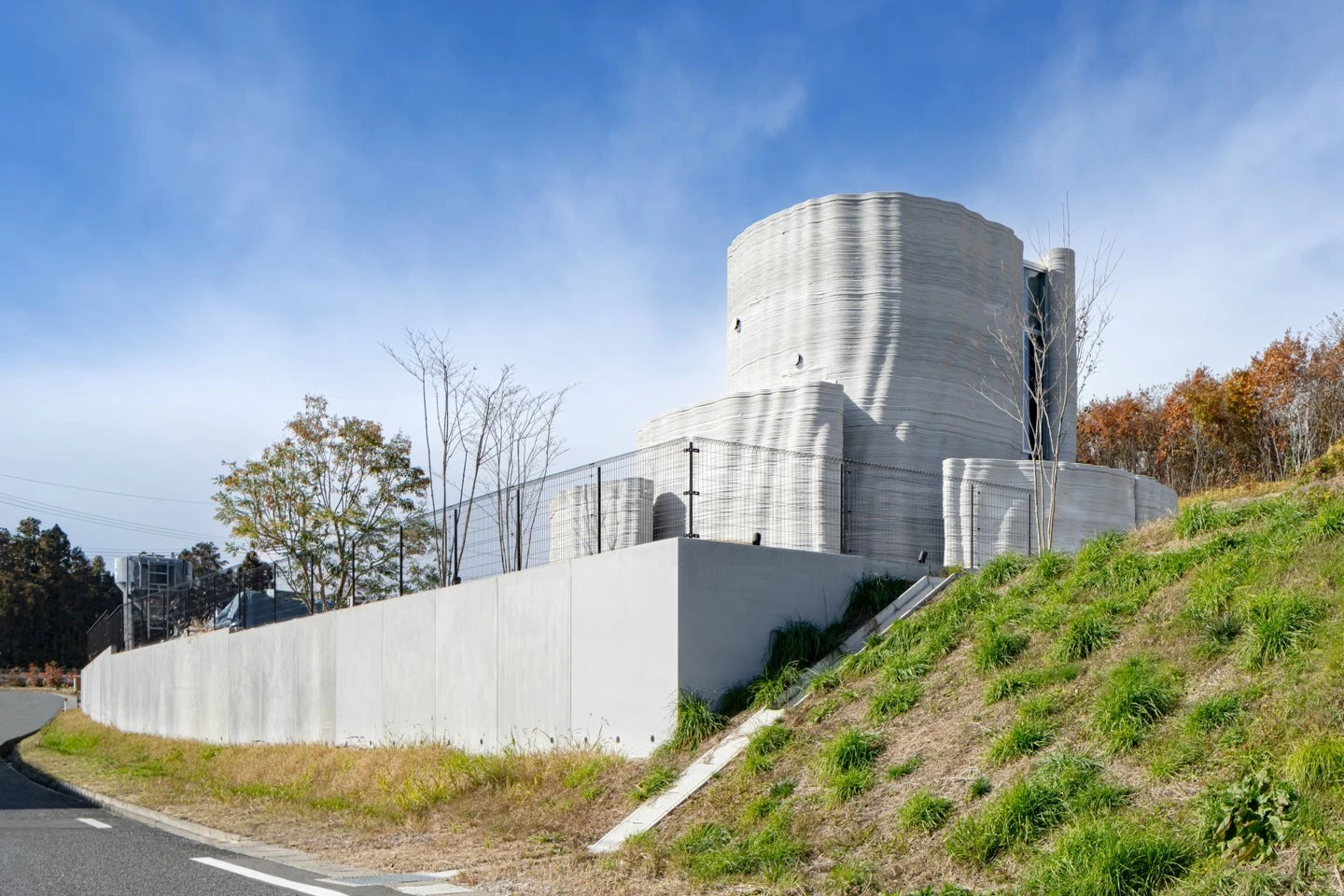 The O House is a compact 3D-printed two-story home that's designed to withstand seismic activity