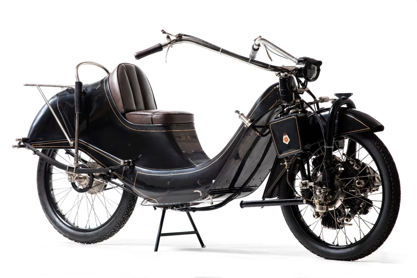 This 1921 Megola 640cc Tourer (Lot 610) sold for £82,140 ($107,019), well below estimate for the ultra rare machine with the unique feature that it's engine is a five cylinder radial located inside the front wheel.