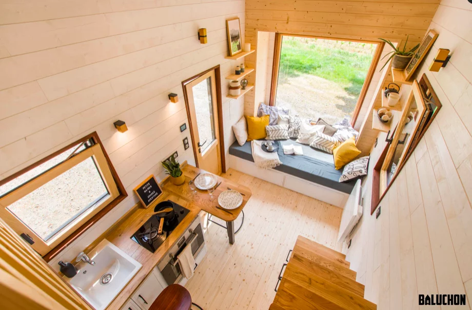 The Piccola Casa's living room includes a sofa that doubles as a guest bed in a pinch