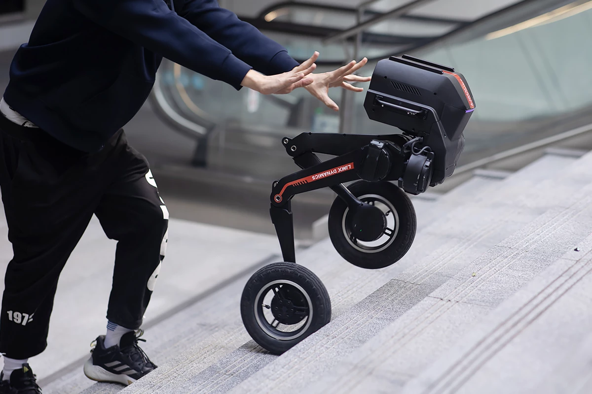 The Tron 1 getting pushed around to demonstrate its self-righting abilities