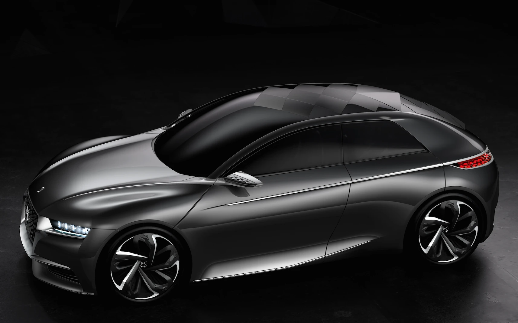 The DS' roofline is low, which accentuates the car's length