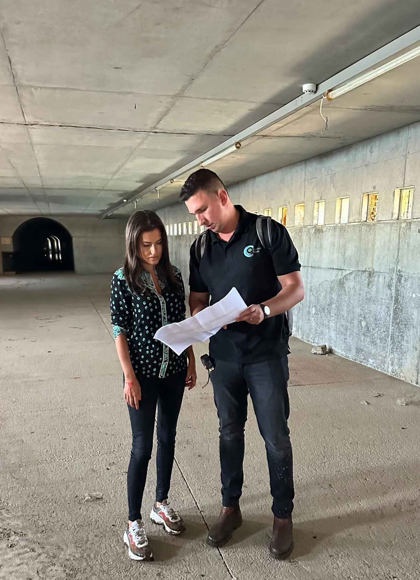EWP founder and CEO Inn Bravermann (left) discussing plans for the installation of Porto's wave energy station, along with a wave energy museum and education center in the space underneath the breakwater