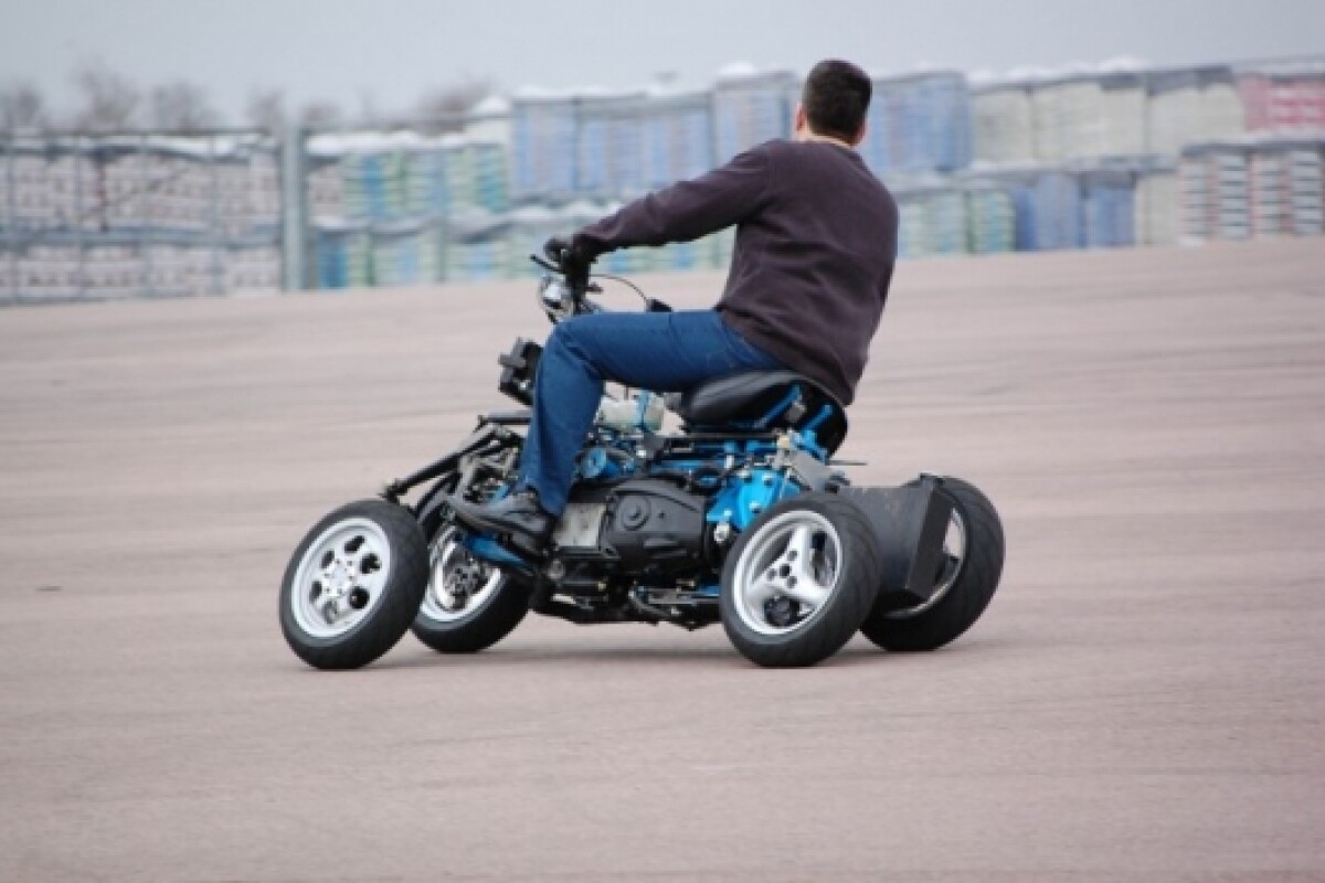 4mc test ride can a motorcycle have four wheels?