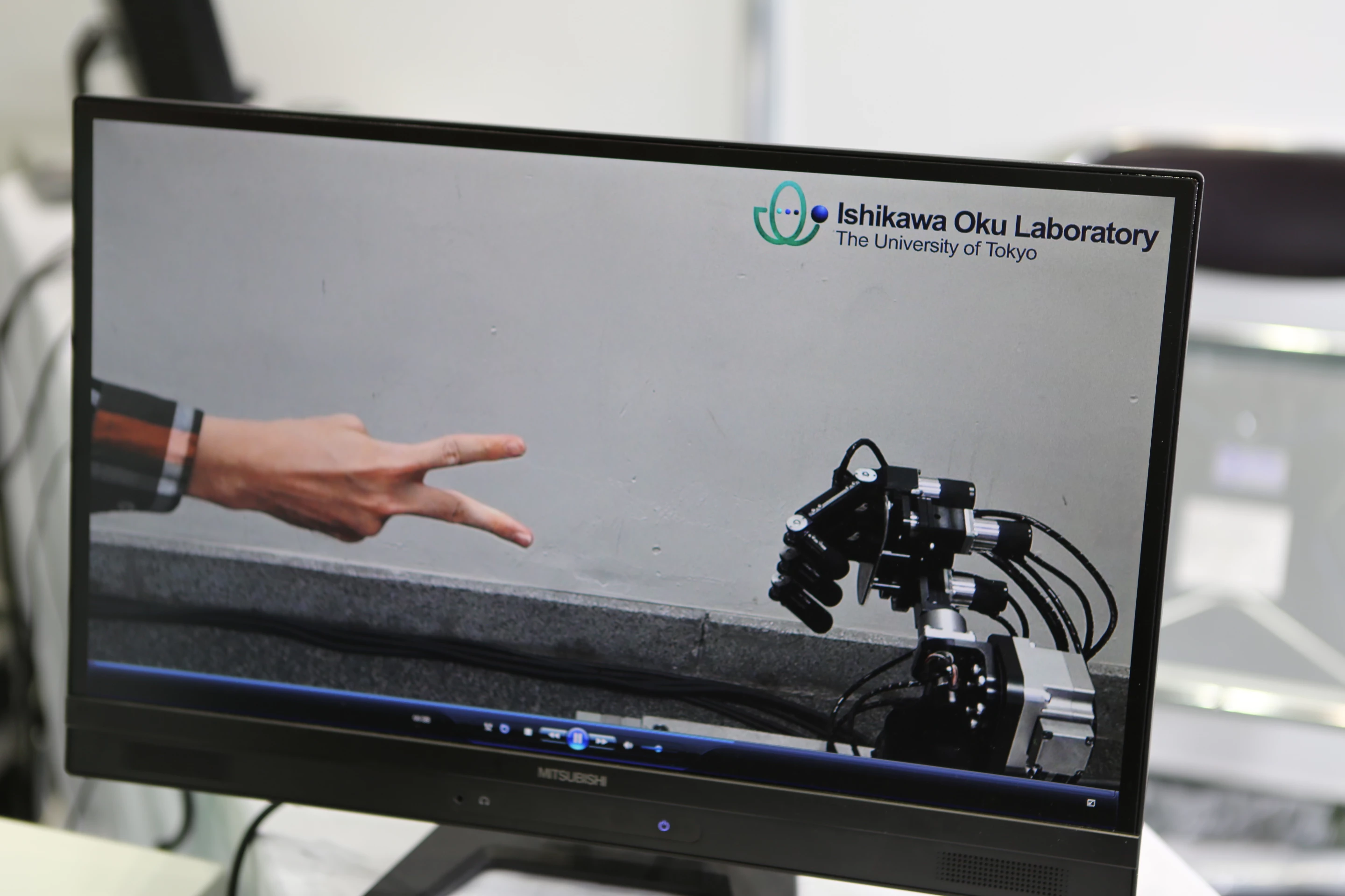 The robot makes a fist for "rock" beating the human's "scissors" (Photo: Mike Hanlon, Gizmag)
