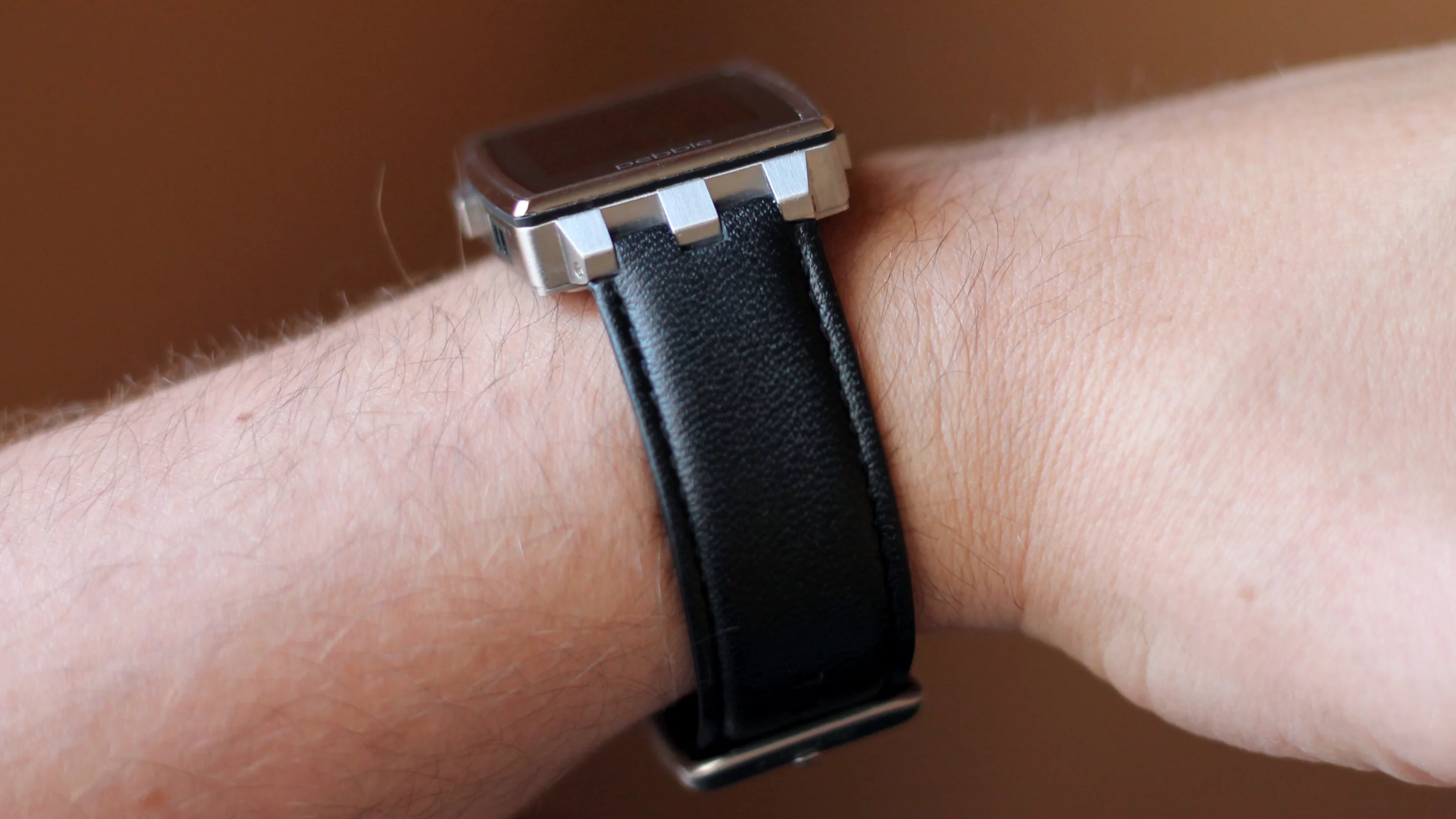 The black leather band (you can also buy it with a matching stainless steel band) is sharp-looking and comfortable