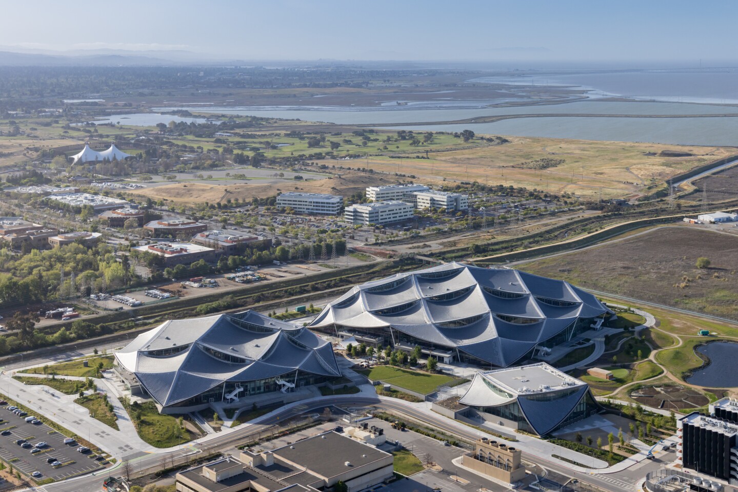 Google Bay View campus is topped by a novel "dragonscale" roof that has integrated solar panels and produces up to 40 percent of its required electricity needs