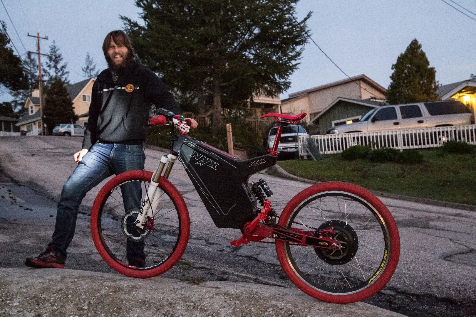 Luke with a milder, more practical and nicer finished electric bike he built for his wife.