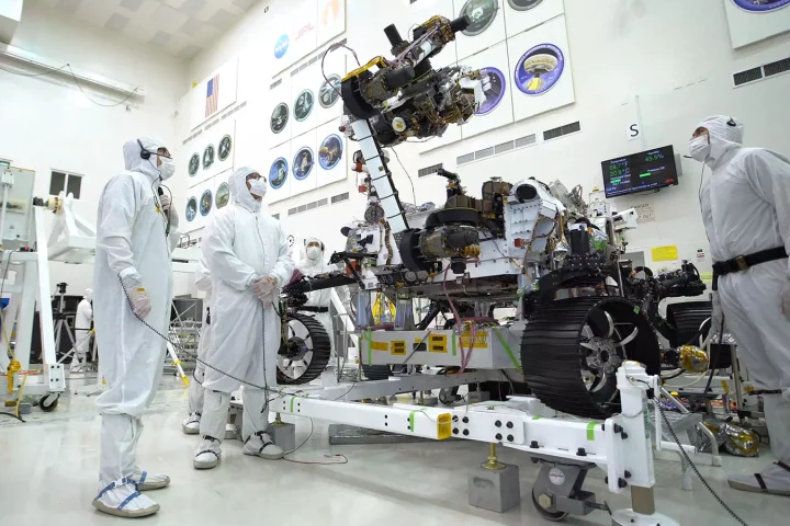 The rover's 7-ft-(2.1-m) arm maneuvers its 88-lb (40-kg) sensor-laden turret as it moves from a deployed to a stowed configuration
