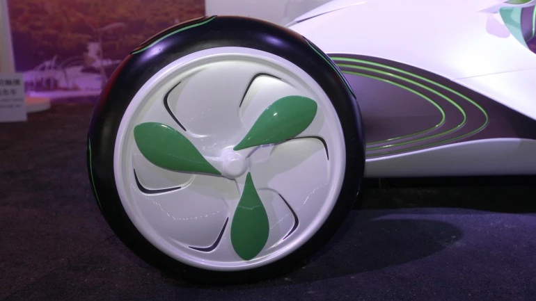 The Yez wheels incorporate small wind turbines to harvest energy from the turbulence and windflow while driving.