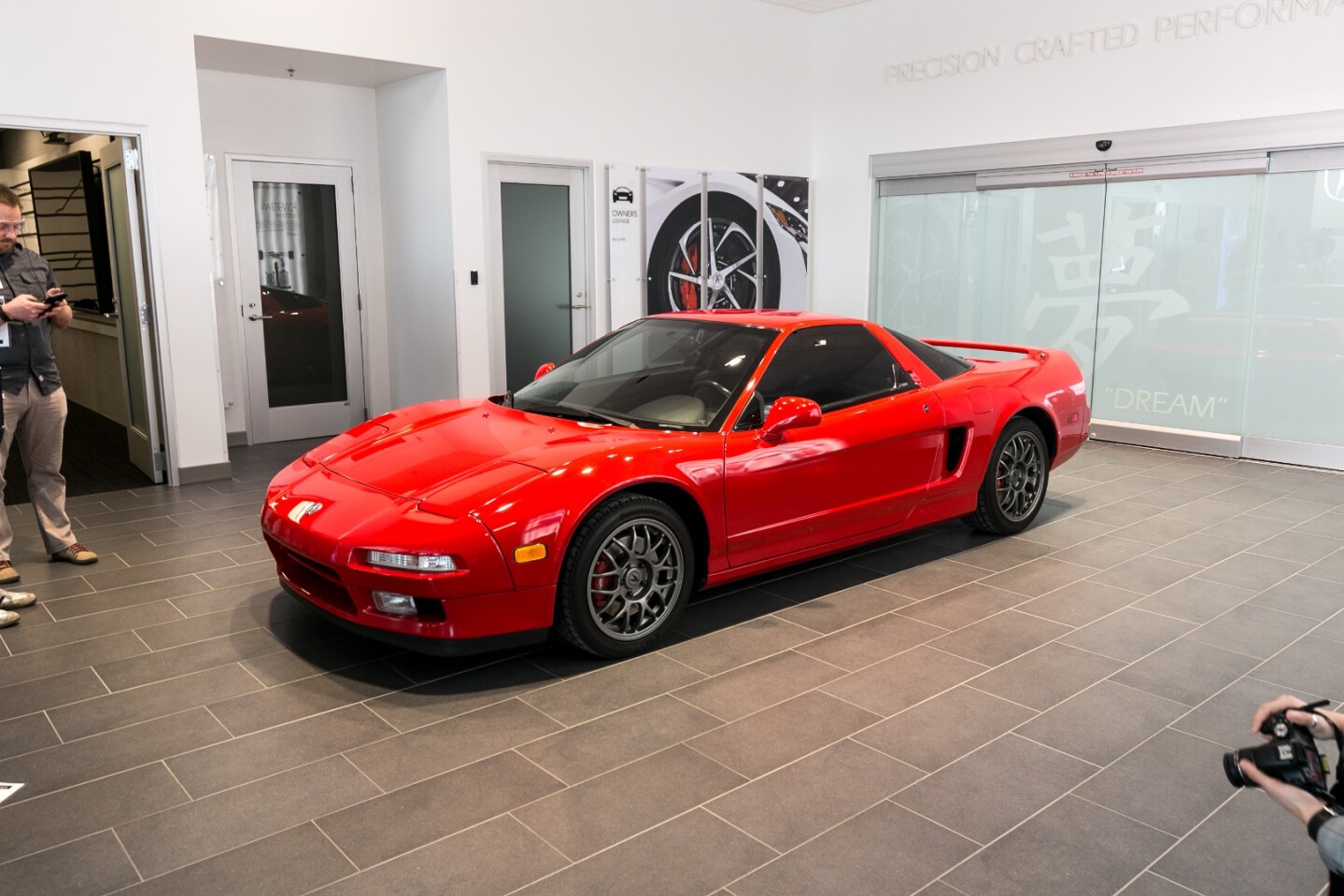 An original NSX (New Sports Experiment) also adorns the factory lobby