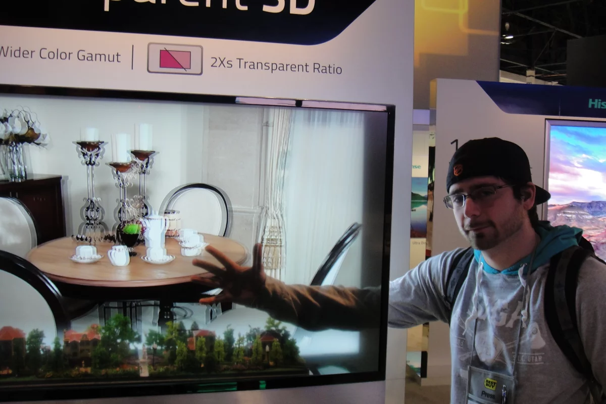 Gizmag's Dave LeClair, demonstrating the transparent 3D TV
